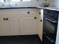 Detail Showing Magic Corner Operating on Hand-painted Bespoke Fitted Kitchen, Bath.(0.8 mb).